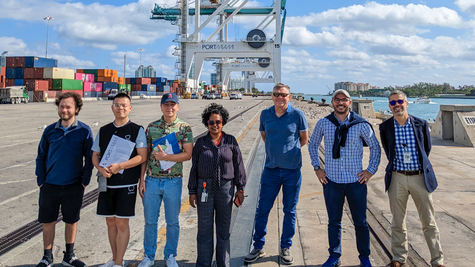 Lucas Britton, Chang Li, Aidan Rowe, professor Shouraseni Sen Roy, professor Richard Grant, associate professor Landolf Rhode-Barbarigos, and Michael Bello, planning manager at the Port of Miami, visited Miami's main cargo and cruise thoroughfare to conduct research. (Photo: Courtesy of Shouraseni Sen Roy/University of Miami)