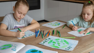 Children draw pictures for Earth Day. (iStock image)