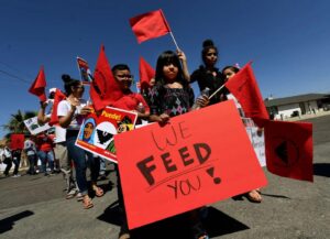 upporters of farmworkers march against anti-immigrant policies in the agricultural town of Delano, California, in 2017. (Mark Ralston/AFP/Getty Images via Grist)