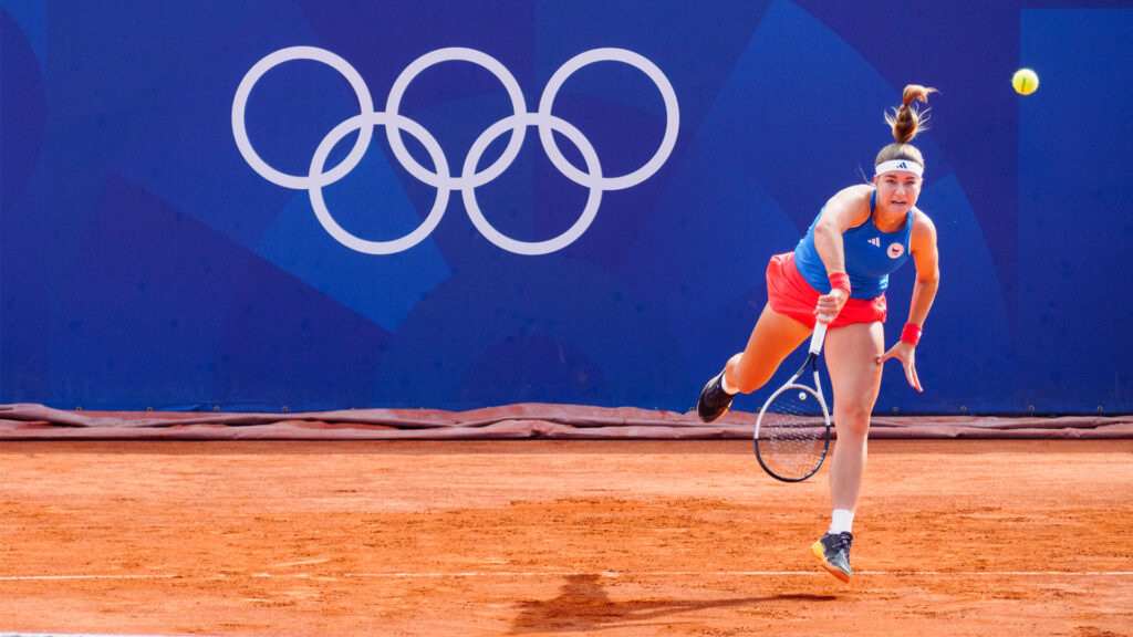 Czech tennis player Karolína Muchová hits a serve at the 2024 Paris Olympics. (Kuberzog, CC BY-SA 4.0, via Wikimedia Commons)