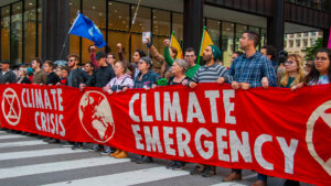 Extinction Rebellion activists protest in Chicago in 2019. (Charles Edward Miller, CC BY-SA 2.0, via Wikimedia Commons)