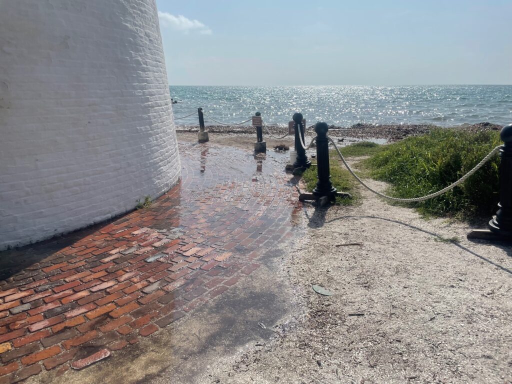 Flooding from king tide at the Bill Baggs Cape Florida Lighthouse at the south end of Key Biscayne in Miami-Dade County (Image courtesy of Sara Ayers-Rigsby)