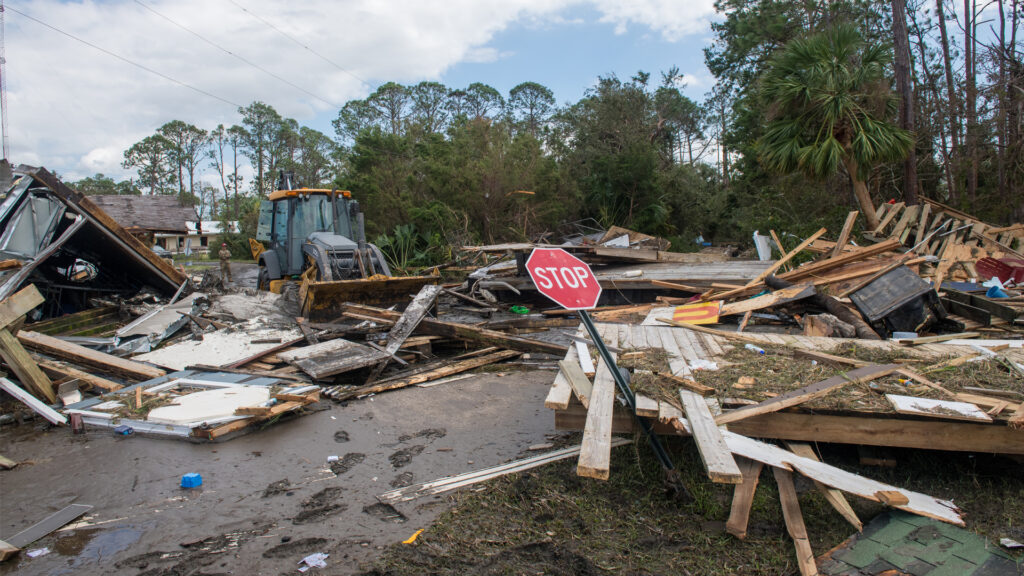 U.S. Airmen assigned to the Florida Air National Guard clear roads in Keaton Beach after the landfall of Hurricane Helene on Sept. 27, 2024. (Staff Sgt. Jacob Hancock/The National Guard, CC BY 2.0, via Wikimedia Commons)