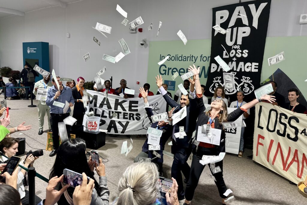 As with most causes debated in the political arena, advocates for climate reparations struggled to break through to the negotiators and the wider public using slogans and theatrics. Loss and Damage fund advocates chanted, “Pay up,” “Make polluters pay" and “You owe us." They pointed out that the $1.3 trillion annually they seek represents only 1% of global GDP. It is also true that if the U.S. alone spent what it did on winning World War II, the climate crisis would command $9 trillion each year, just from our nation. Global annual subsidies for fossil fuels are estimated to be $7 trillion each year. (Photo by Michal Fidler, text by John Capece)