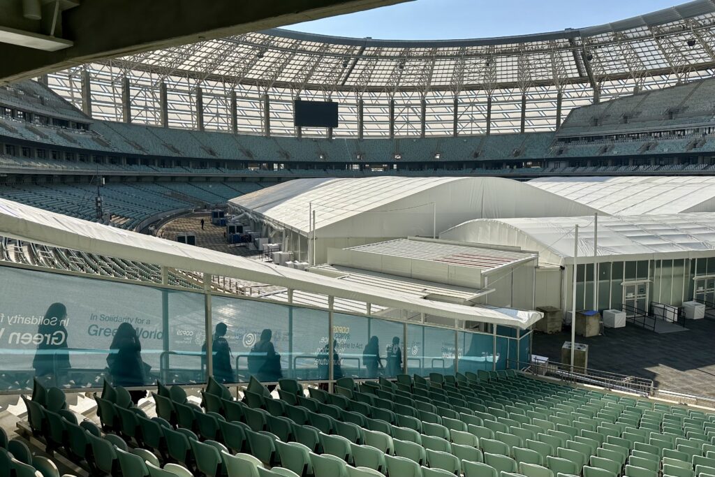 The conference venue is a series of temporary structures assembled in and around Baku’s 70,000-capacity stadium. Whereas 85,000 people attended COP28 in Dubai UAE (a petro state that produces four times the fossil fuels of the USA or Azerbaijan, per capita), fewer than 30,000 are estimated to be attending COP29. Kicking off Nov. 11, a final head count will be reported when the conference ends Nov. 22. (Photo by Michal Fidler, text by John Capece)