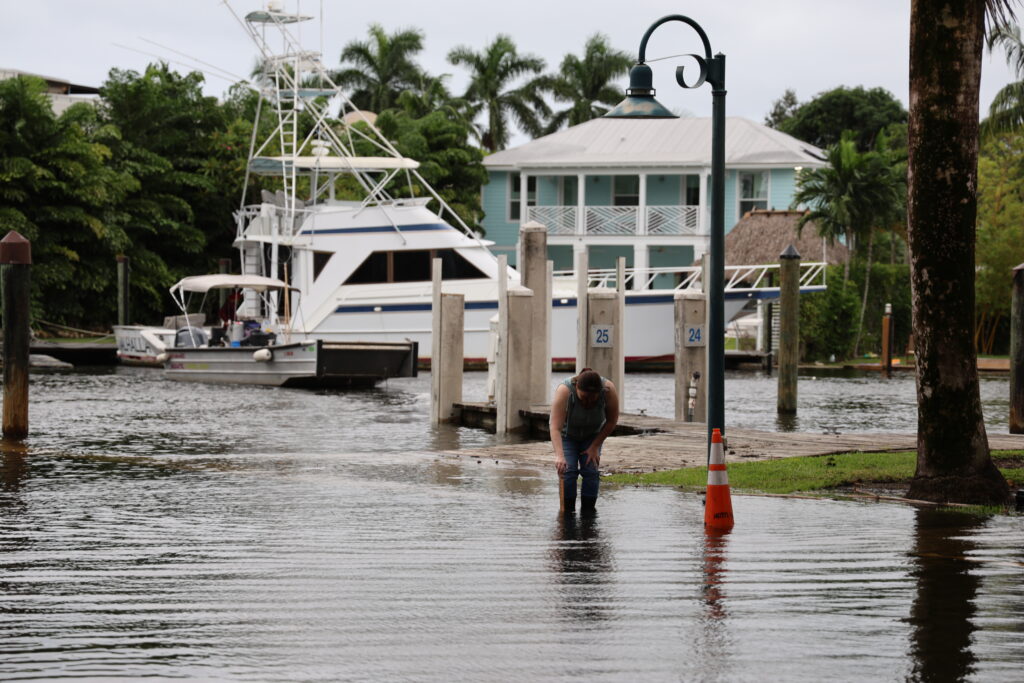 FAU Center for Environmental Studies staff measure water levels in Fort Lauderdale during king tide flooding on Oct. 18. (FAU CES)