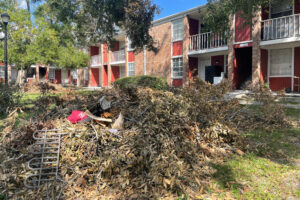 A nearby drainage failure forced a rush of water into Charlene Love’s apartment complex. Some of her neighbors lost everything. (Credit: Amy Green/Inside Climate News)