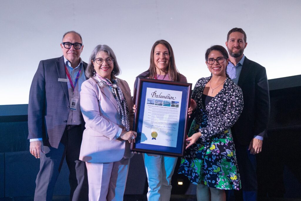 (From left) Frost Science President and CEO Dr. Doug Roberts, Miami-Dade County Mayor Daniella Levine Cava, Shannon Jones, Loren Parra and Dr. Wesley Brooks commemorate Nov.13, 2024, as ReeFLorida at Frost Science Day. (Photo courtesy of Frost Science)