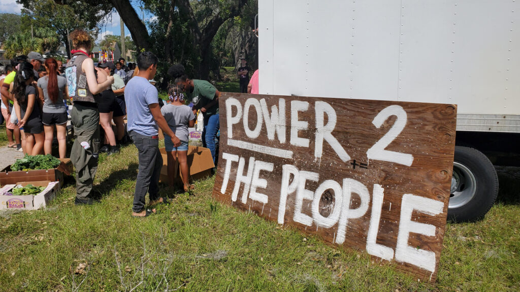 People distribute and share supplies, food and other essentials in a community impacted by flooding from Hurricane Milton in Tampa. (Photo courtesy of Mutual Aid Disaster Relief)