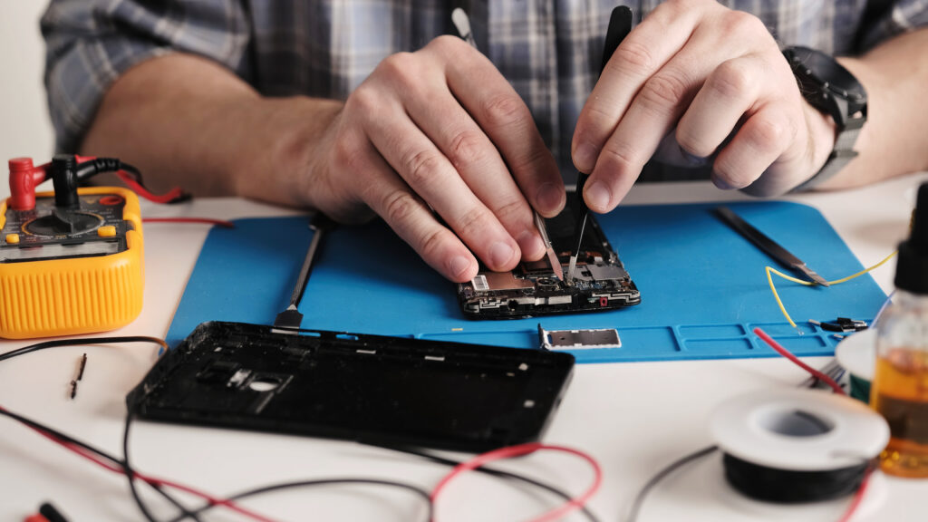 A smartphone being repaired (iStock image)