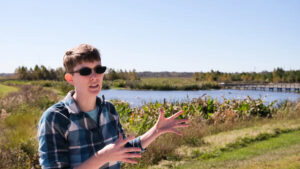 Betsy Riley speaks with Grist about Alachua County’s climate action plan at Sweetwater Wetlands Park, one of Alachua County’s 11 nature preserves. (Sachi Kitajima Mulkey/Grist)